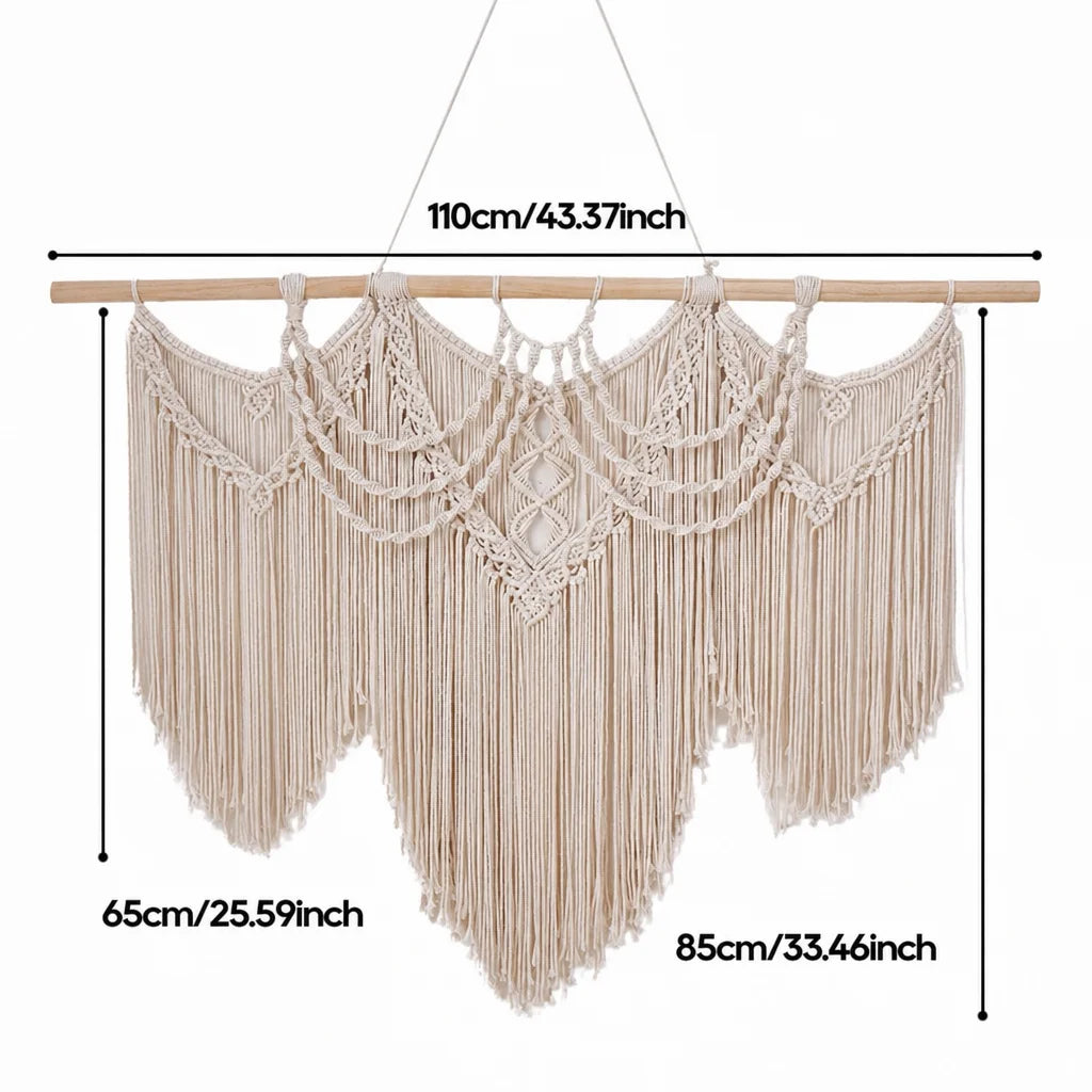 Cream cotton macrame wall hanging with wooden dowel and arched diamond motifs with long fringe