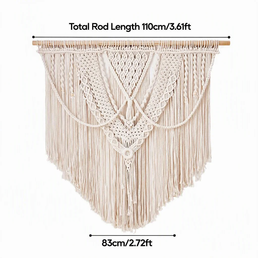 Cream cotton macrame wall hanging with wooden dowel, diamond braids, and long fringe tassels
